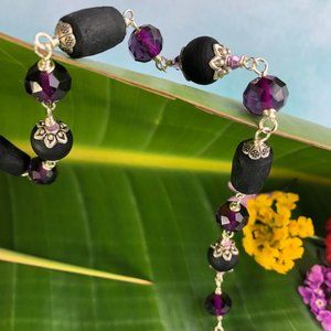 35  3/4" black  Tulasi with purple crystal glass beads